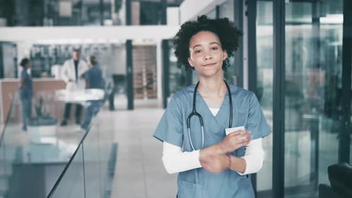 Hospital, face and confident nurse with smile, arms crossed and professional career in healthcare