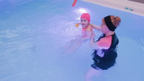 Reflection of Light Bulb on Pool Water Surface