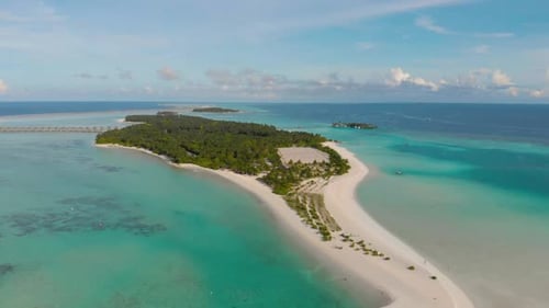 Drone flight over remote island in exotic maldives. Filmed in 4k 30p.