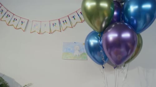 Birthday Party Setup with Balloons and Treats