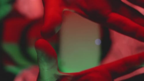 Man Wearing VR Headset With Abstract Lighting