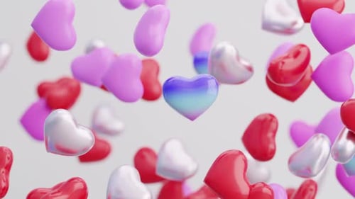 Glossy 3D Hearts Floating and Spinning for Love and Celebration Backgrounds