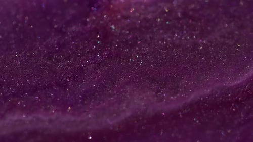 Shimmering Glittering Purple Liquid Macro Shot