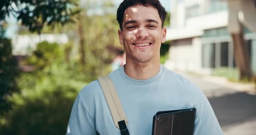 Face, student and happy man with tablet for education, academic confidence and smile in college