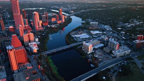Wavy Colorado River flowing through the cityscape of Austin, Texas, USA.