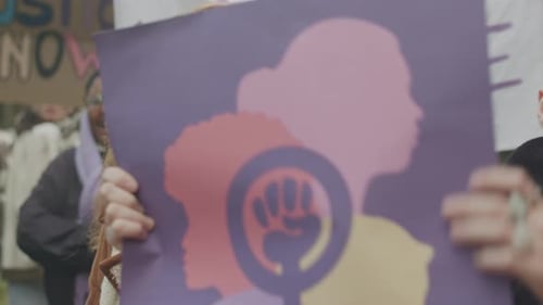Diverse Feminist Women with Posters and Banners on Strike
