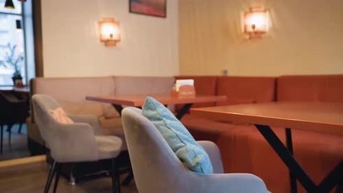 Interior Display of Modern Restaurant with Cozy Seating and Soft Lighting