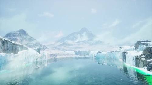 Vast Ocean View With Distant Snow Covered Mountain Range Rising