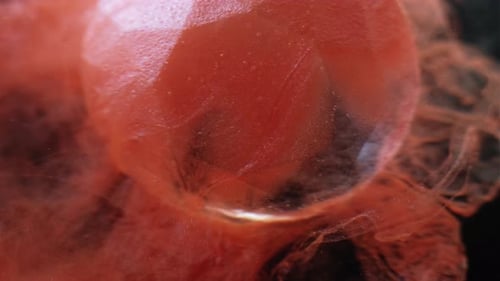 Orange Cloud Flowing Around Crystal Ball