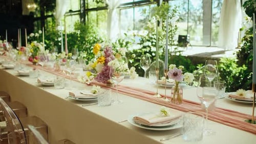 Beautifully Decorated Wedding Reception Table with Flowers and Candles