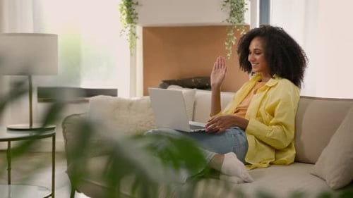 Woman on Laptop Having a Video Call