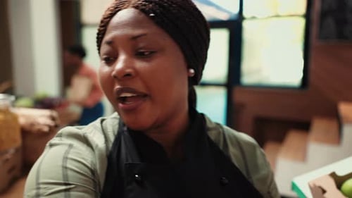 Woman Talking in Bright, Natural Food Store