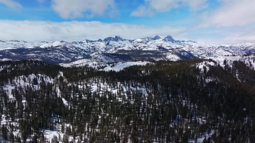 Banner peak Minaret Summit Pass Mammoth Mountains vista Parallax winter aerial drone California