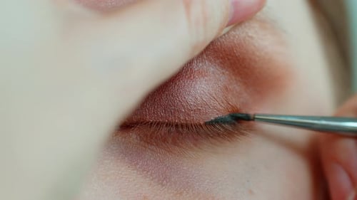 Makeup Artist Work in Her Beauty Studio Portrait of Woman Applying By Professional Make Up Master