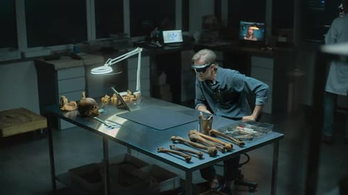 Scientist Studies Bones With Augmented Reality Glasses in Lab