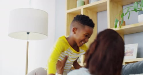 Mother and Son Playing Together at Home