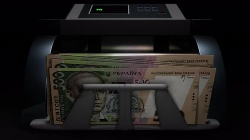 500 Ukrainian hryvnia in cash dispenser. Withdrawal of cash from an ATM.