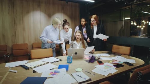 Women Collaborating in the Office on a Work Project