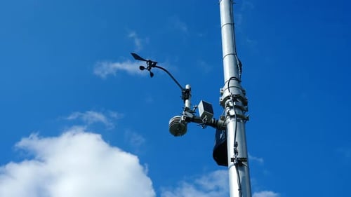 Close up low angle shot of weather station instruments on sunny day