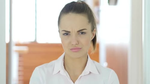 Shaking Head to No Rejecting Woman in Office