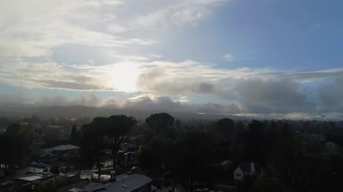 4K Aerial Drone footage of Studio City, CA with rain fall and cloudy skies. 30FPS Static