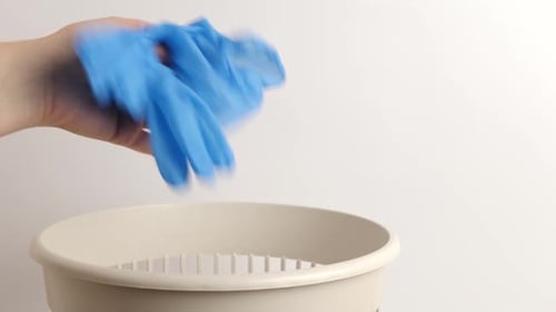 Disposable Glove Thrown Away in Studio Setting