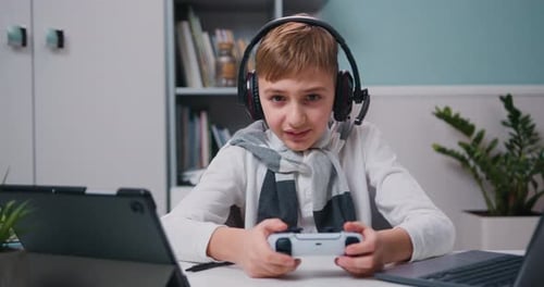 Happy child have fun relax after school lessons indoors Game addiction concept. Portrait of excited