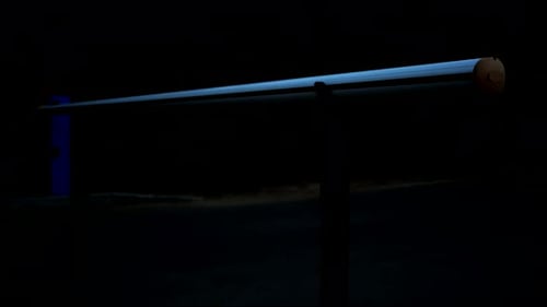 Night Seamlessly Looped Shot Of A Lowered Barrier With A Flashing Green Warning Strip
