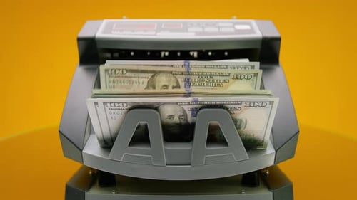 Money Counter Processing US Dollar Bills