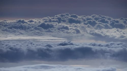 Billowing Cumulus Clouds Moving in the Sky