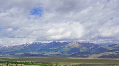 Vast Mountain Range With Grassy Plains Landscape