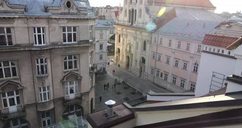 People on the square of an old European city. Architecture.