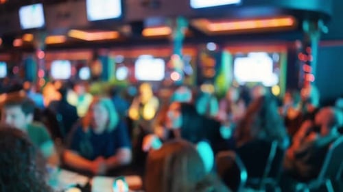 Blurred Crowd at Night in Restaurant Casino