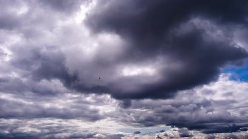 Storm Clouds Panning Across Dramatic Gray Sky