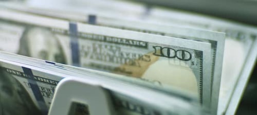 Counting Machine counting dollars