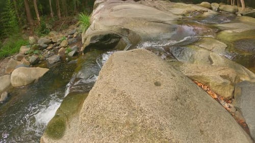 4K Flowing River, Forest Creek Running Along into Mouth of River to Waterfall