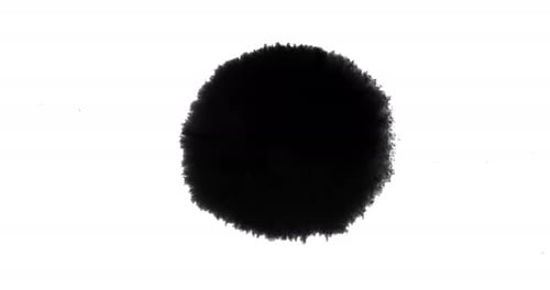 Expanding Black Ink Blot on White Background