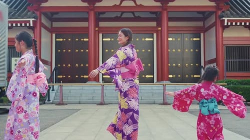 Woman and Children in Kimonos Dancing