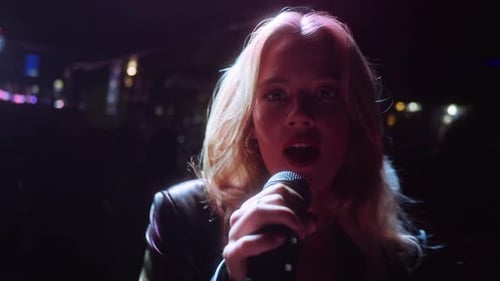 Close Up of Woman Singing Karaoke