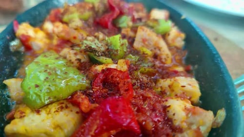 Close up of Meat and Peppers in Pan