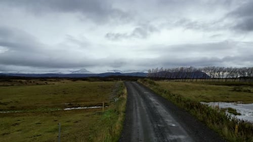Lonely Road in Beautiful, Iceland Remote Landscape - Aerial Drone Flight with Copy Space