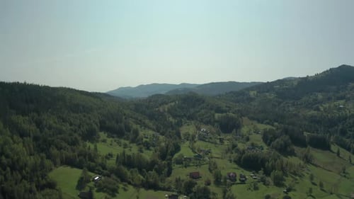 Aerial Drone Wide Shot of Carpathian Mountains and Green Forest