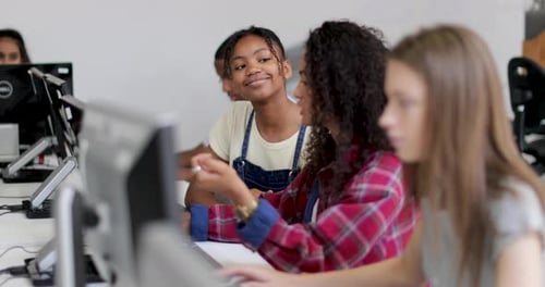 Students working together in a computer science class