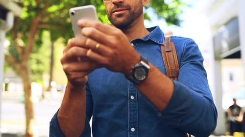 Man, happy and phone in street with typing for directions, text message