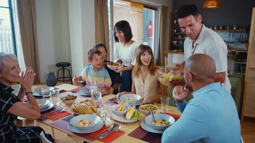 Happy Family Sharing a Meal at Home