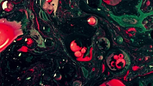 Captivating Red Green Blue Orange Black Colors in Slow Motion on Texture