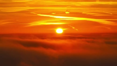 Aerial view of sunrise above the clouds, England.