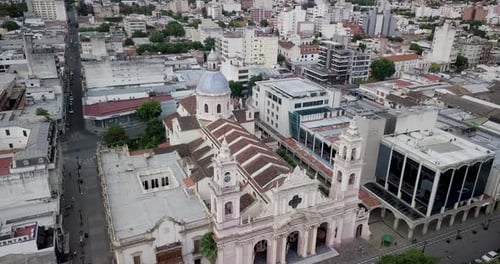 Aerial view above Cathedral Basilica of Salta, Surrounded by city buildings, Argentina.