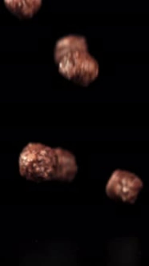 Chocolate Corn Balls Fall on the Table Filmed on a Highspeed Camera at 1000 Fps