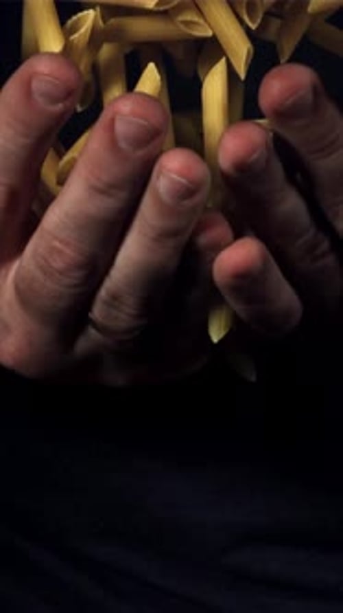 Dry Pasta Flies Up and Falls in your Hands Filmed on a Highspeed Camera at 1000 Fps